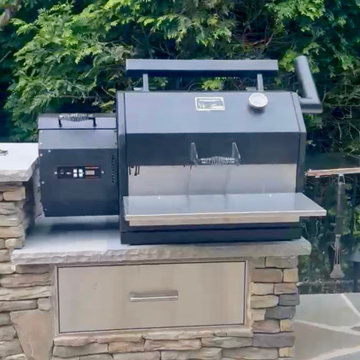 Outdoor Kitchen with Fire Feature & Beer Tap and Flagstone Patio