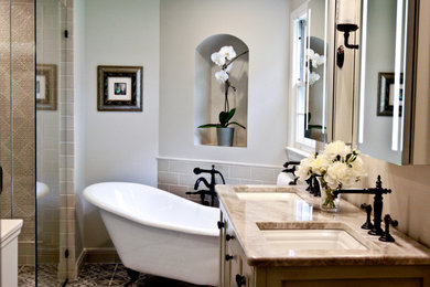 Inspiration for a mid-sized timeless master gray tile and porcelain tile cement tile floor and multicolored floor bathroom remodel in Milwaukee with raised-panel cabinets, gray cabinets, a one-piece toilet, gray walls, an undermount sink, quartzite countertops, a hinged shower door and beige countertops