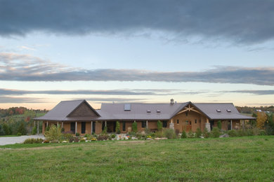 Large rustic brown split-level gable roof idea in Toronto