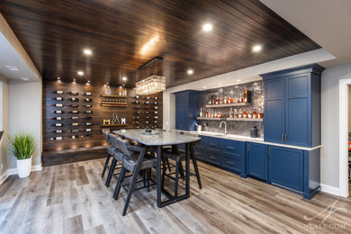Example of a trendy home bar design in Cincinnati