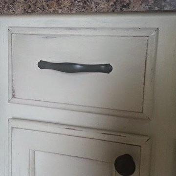 Painted distressed kitchen cabinets