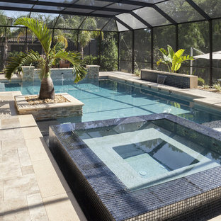 タンパの大きいL型コンテンポラリースタイルのおしゃれなプール (タイル敷き) の写真