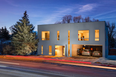 Trendy two-story exterior home photo in Other