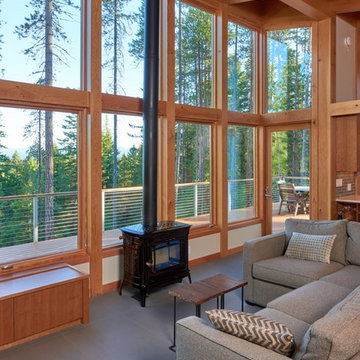Another view of living room and wood stove.