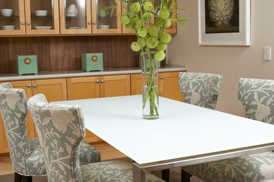 Example of a mid-sized transitional light wood floor kitchen/dining room combo design in San Francisco with beige walls