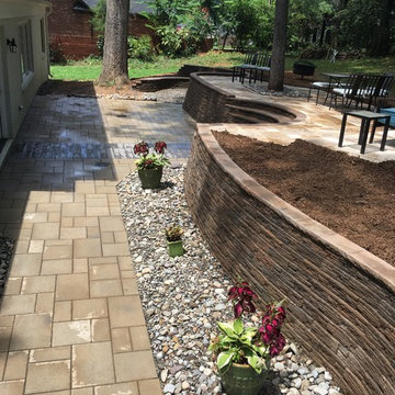 Multi-Level Paver Patio with Staircase and Seating