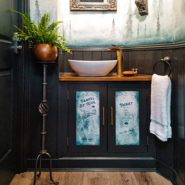 Vintage travel themed downstairs cloakroom w/c