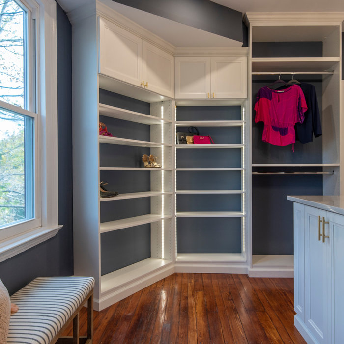 Dressing room - large transitional gender-neutral vinyl floor dressing room idea in Philadelphia with shaker cabinets and white cabinets