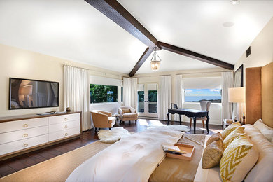 Photo of a country master bedroom in Los Angeles with white walls, dark hardwood floors and no fireplace.