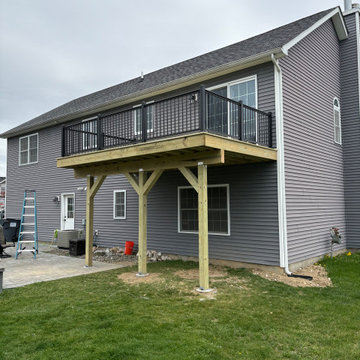 Pressure Treated Wood Deck with black powder coated rail