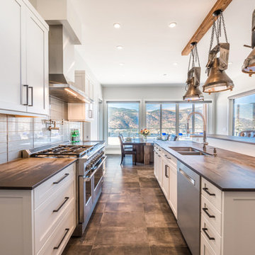 Galley Kitchen, Kelowna, BC Features Large Two-Tier Island