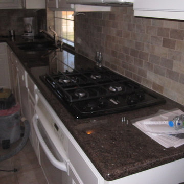 Tile Brick Pattern Splash with Labrador Antique Granite Tops Plano, TX