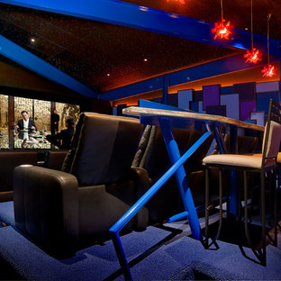 Home theater - contemporary enclosed carpeted and blue floor home theater idea in Cleveland