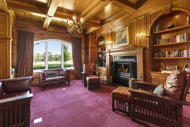 Photo of a traditional family room in Melbourne with a library.