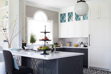 Eat-in kitchen - large transitional u-shaped medium tone wood floor eat-in kitchen idea in Montreal with an undermount sink, shaker cabinets, black cabinets, solid surface countertops, gray backsplash, ceramic backsplash, paneled appliances and a peninsula