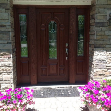 Wood Front Door with Stone Surrounding