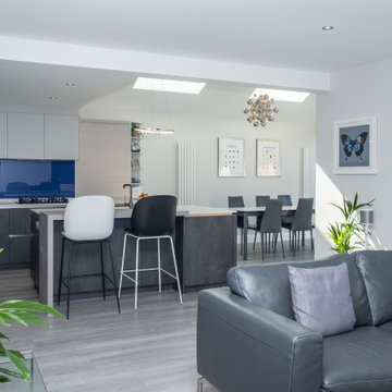 Handless Kitchen with Blue Splashback in Stanmore By Kudos Interior Designs