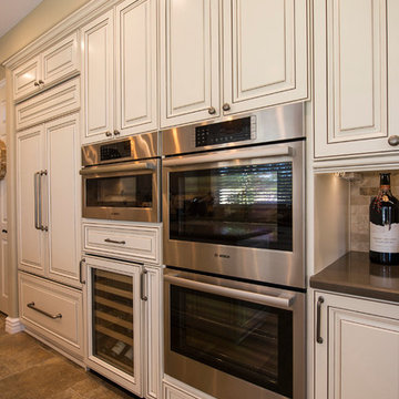 Transitional Kitchen in White With Some Traditional Flavors