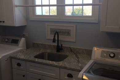 Inspiration for a laundry room remodel in Other