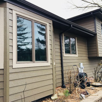 Diamond Kote siding, aluminum Dark bronze soffit and gutters