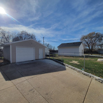 New Garage with Chain Link Fence