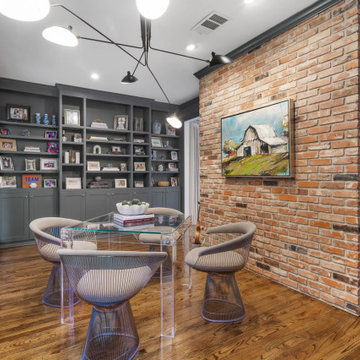 Contemporary Study Room with Industrial Brick Accent Wall and Modern Lighting