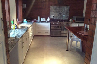 Inspiration for a mid-sized contemporary home design remodel in Other
