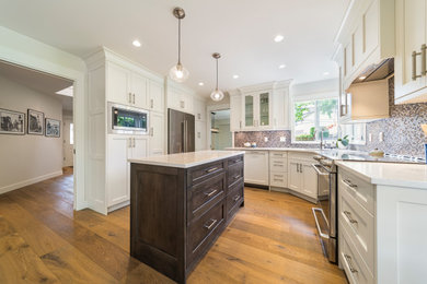 Example of a transitional kitchen design in Vancouver