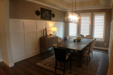 Inspiration for a mid-sized cottage wall paneling dining room remodel in Other