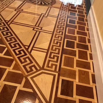 Decorative border frames the flooring much like a picture frame