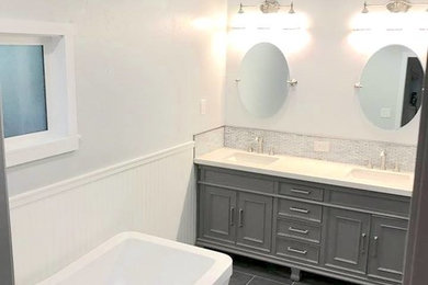 Example of a transitional bathroom design in Other