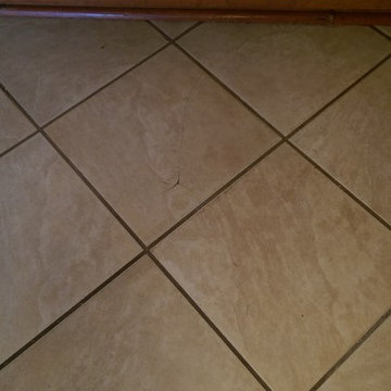 Ceramic Kithcen that has missing and damaged grout