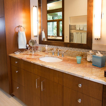 Bathroom vanity w/ custom framed mirror/ window combo.