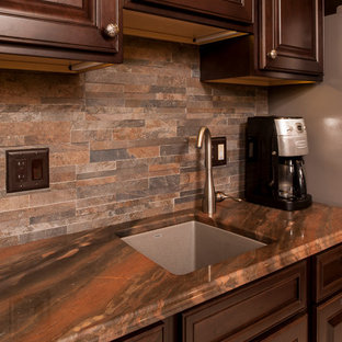 Holiday Kitchens Cherry Cabinets, Copper Dune Quartzite counters, stacked stone