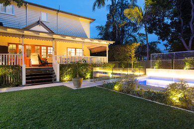 Photo of a contemporary home design in Brisbane.