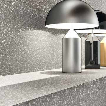 Salt and pepper terrazzo looking tile in bathroom