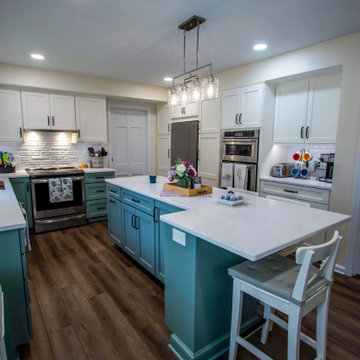 Custom Two-Toned Green and White Kitchen with Laventa Carrara Quartz Countertops
