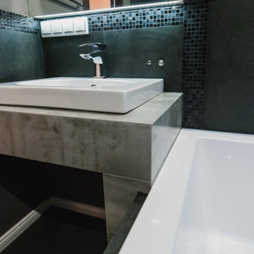 Trendy bathroom in dark color with LED lighting and sound system