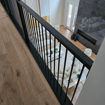 Project #130 | Curved Staircase with Wraparound Balcony
