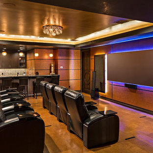 Example of a transitional enclosed home theater design in Phoenix with brown walls and a projector screen