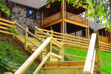 Mountain style home design photo in Other