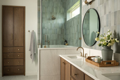 Example of a large trendy master green tile and ceramic tile porcelain tile, white floor and double-sink corner shower design in Austin with quartzite countertops, a hinged shower door, white countertops, a built-in vanity, shaker cabinets, dark wood cabinets, white walls and an undermount sink
