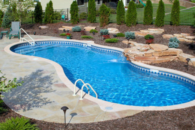 Beach style swimming pool in Philadelphia.