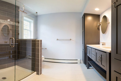 Inspiration for a modern bathroom remodel in Portland Maine with black cabinets and gray walls