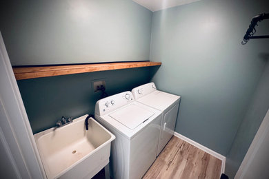 Inspiration for a modern laundry room remodel in Detroit