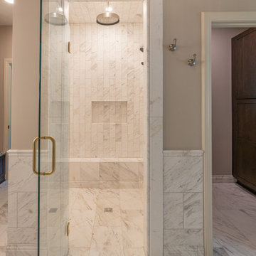 Leawood, Kansas Marble Wrapped Primary Bathroom Remodel