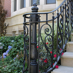 Solid stone stairs with ornamental iron railing - Products