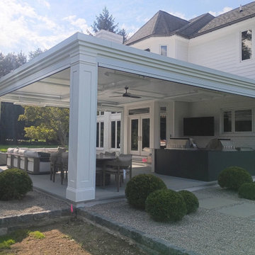 Custom column wrap trim on a motorized louvered pergola