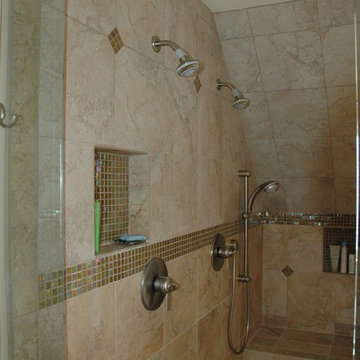 Large master shower tucked into a sloped ceiling