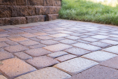 Inspiration for a small backyard concrete paver patio remodel in Minneapolis